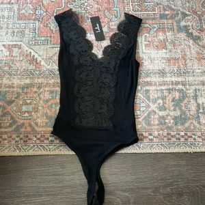 Lulu’s Black Lace Body Suit